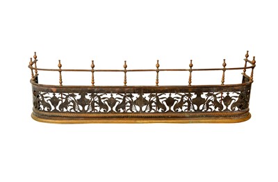 Lot 212 - A EARLY 19TH CENTURY ENGLISH CHASED BRASS FIRE FENDER