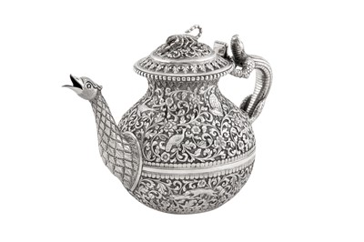 Lot 228 - A fine late 19th century Anglo – Indian silver teapot, Cutch, Bhuj circa 1880 by Oomersi Mawji (active 1860-90)