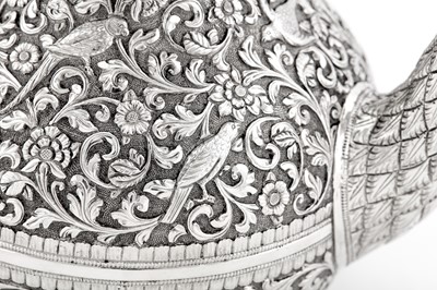 Lot 228 - A fine late 19th century Anglo – Indian silver teapot, Cutch, Bhuj circa 1880 by Oomersi Mawji (active 1860-90)