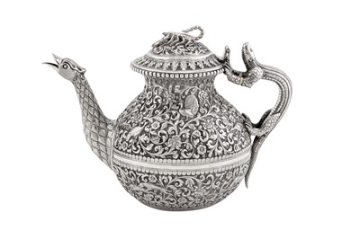 Lot 228 - A fine late 19th century Anglo – Indian silver teapot, Cutch, Bhuj circa 1880 by Oomersi Mawji (active 1860-90)
