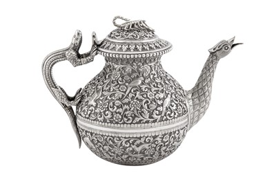 Lot 228 - A fine late 19th century Anglo – Indian silver teapot, Cutch, Bhuj circa 1880 by Oomersi Mawji (active 1860-90)