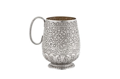 Lot 154 - A large late 19th century Anglo – Indian unmarked silver mug, Kashmir circa 1880