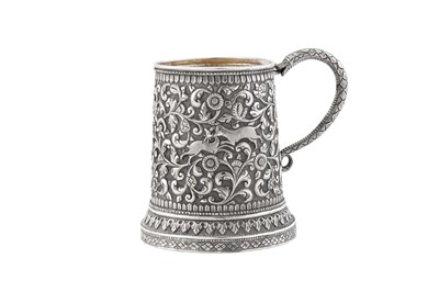 Lot 197 - A late 19th century Anglo – Indian unmarked silver christening mug, Cutch circa 1890