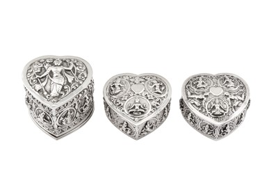 Lot 42 - A pair of late 19th / early 20th century Anglo – Indian unmarked silver dressing table boxes, Madras circa 1900