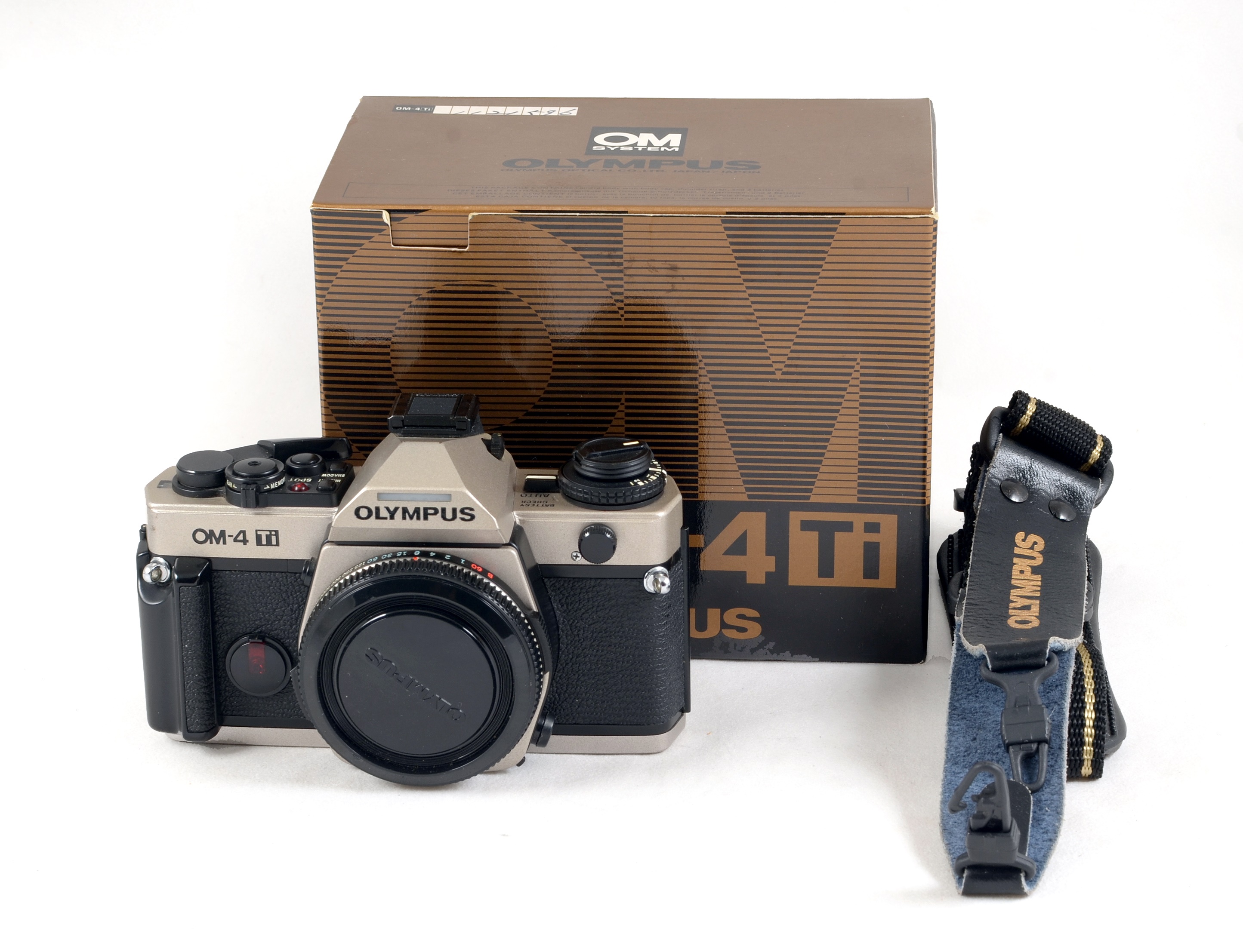 Lot 100 - A Boxed Olympus OM-4Ti Film Camera.