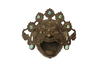 Lot 362 - A TIBETAN BRONZE 'VAJRADAKA' HEAD