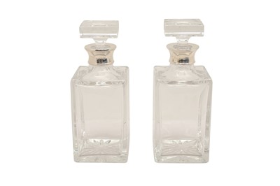 Lot 106 - A PAIR OF ELIZABETH II STERLING SILVER MOUNTED GLASS DECANTERS, LONDON 2006 BY J A CAMPBELL
