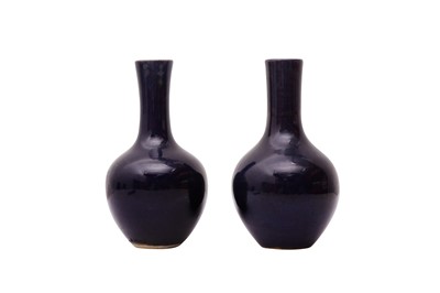 Lot 35 - TWO SMALL CHINESE MONOCHROME BLUE-GLAZED VASES