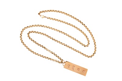 Lot 37 - A 9CT GOLD INGOT PENDANT ON CHAIN