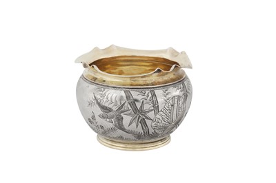 Lot 392 - A Victorian ‘aesthetic movement’ parcel gilt sterling silver sugar bowl, London 1882 by George Fox