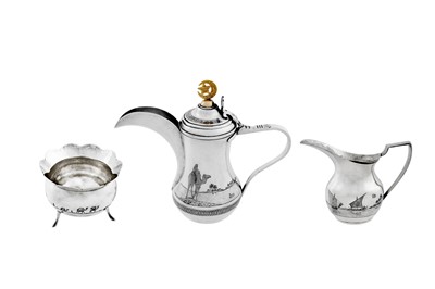 Lot 236 - A fine early 20th century Iraqi silver and niello four-piece coffee service, circa 1930 signed Onaisi (Onaisi Al Fayyadh)