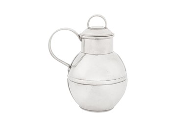 Lot 350 - An Elizabeth II Channel Islands sterling silver ‘Art and Crafts’ Jersey churn cream jug, Guernsey 1989 by Bruce Russell (active from 1974)