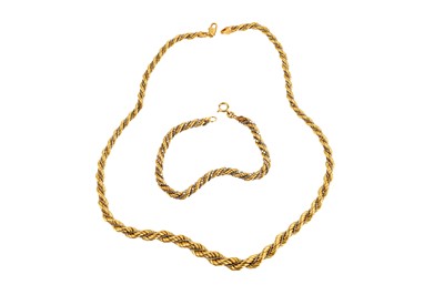 Lot 26 - A ROPE TWIST NECKLACE AND BRACELET SUITE BY UNO-A-ERRE