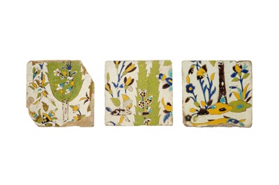 Lot 229 - THREE SAFAVID CUERDA SECA POTTERY TILES