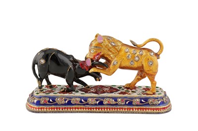 Lot 347 - AN INDIAN POLYCHROME-ENAMELLED AND GEM-SET GOLD ANIMAL FIGURINE