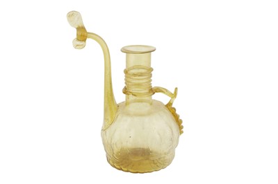 Lot 155 - A MOULD-BLOWN YELLOW GLASS EWER