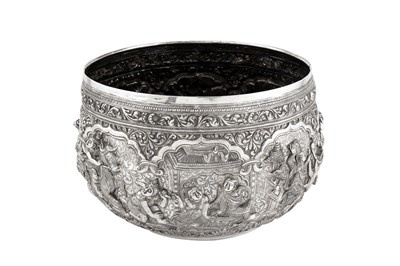 Lot 456 - A BURMESE REPOUSSÉ SILVER BOWL WITH FIGURAL DECORATION