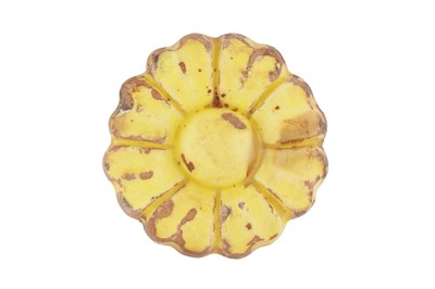 Lot 283 - A MOULDED YELLOW-GLAZED ARCHITECTURAL FLORAL TILE