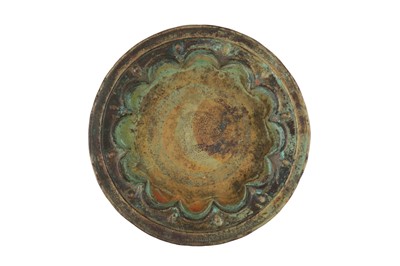 Lot 129 - AN ENGRAVED COPPER PLATE WITH SPHINX AND FLORIATED KUFIC CALLIGRAPHY