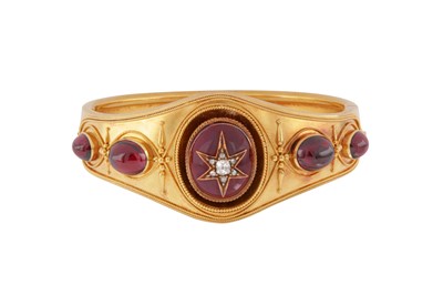 Lot 9 - A garnet and diamond bangle, circa 1865
