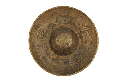 Lot 125 - AN ENGRAVED BRASS 'MAGIC' BOWL WITH THE PROPHET'S CENOTAPH AND MINBAR SYMBOLS