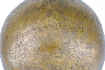 Lot 239 - A LARGE ENGRAVED BRASS CELESTIAL GLOBE WITH BURAQ AND VIEWS OF ISLAMIC HOLY CITIES