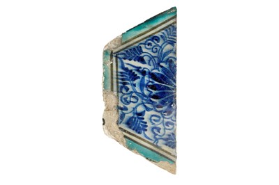 Lot 114 - A FRAGMENT OF MAMLUK HEXAGONAL POTTERY TILE