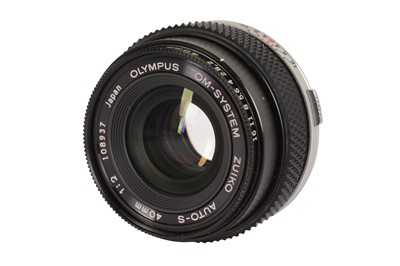 Lot 244 - A Olympus OM-System 40mm f/2 Zuiko Auto-S Pancake Lens