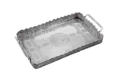Lot 199 - An early 20th century Sudanese silver twin handled tray, Omdurman dated 1922
