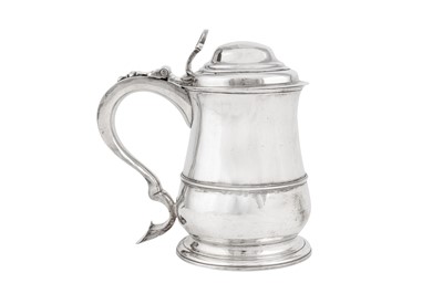 Lot 514 - A George II sterling silver quart tankard, London 1748 by Gabriel Sleath (this mark reg. 18th June 1739)