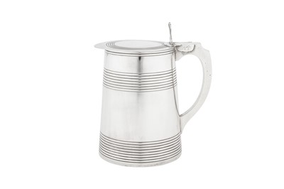 Lot 489 - A George III sterling silver quart tankard, London 1784 by Benjamin Mountigue