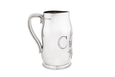 Lot 407 - A Victorian sterling silver ‘blackjack’ jug or ewer, London 1890 by Cornelius Joshua Vander