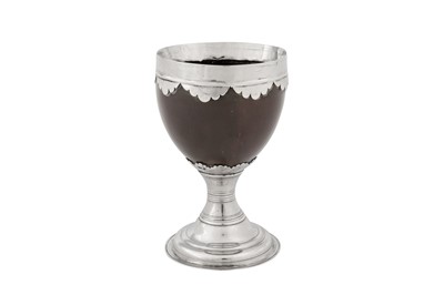 Lot 495 - A George III probably Scottish provincial silver mounted coconut cup, circa 1760, marked WM twice