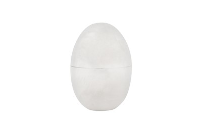 Lot 60 - An Elizabeth II sterling silver egg box, London 1974 by Alfred Dunhill