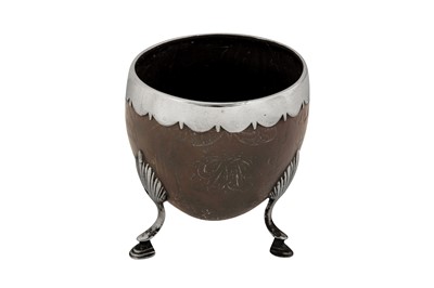 Lot 496 - A George III  unmarked silver mounted coconut cup, circa 1780