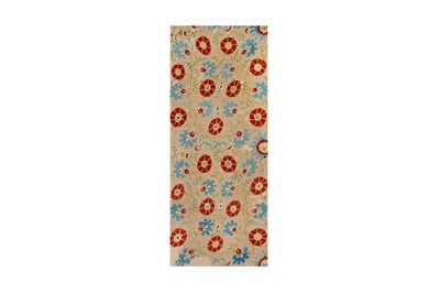 Lot 513 - A LINEN TURBAN COVER WITH FLORAL MOTIFS