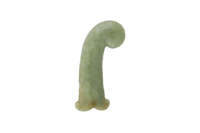 Lot 274 - A MUGHAL CARVED CELADON JADE HILT