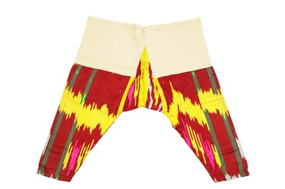 Lot 355 - A PAIR OF SILK IKAT TROUSERS
