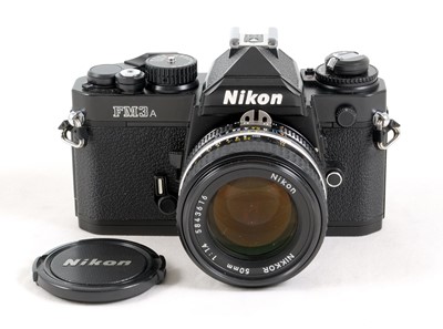 Lot 176 - A Black Nikon FM3A Body with 50mm f1.4 Lens.