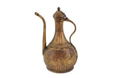 Lot 395 - AN ENGRAVED GILT-COPPER EWER