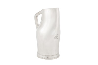 Lot 408 - A large Victorian sterling silver ‘blackjack’ jug or ewer, London 1876 by Francis Boone Thomas