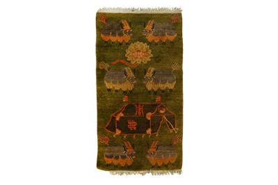 Lot 386 - A TIBETAN RUG