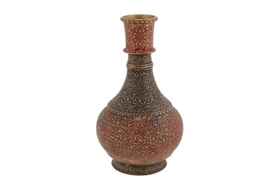 Lot 261 - A RED AND BLACK ENAMELLED COPPER EWER