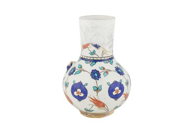 Lot 393 - AN IZNIK POTTERY JUG WITH POMEGRANATES AND ÇINTAMANI MOTIFS