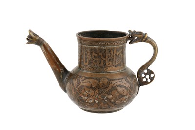 Lot 130 - A SMALL INCISED TINNED COPPER TIMURID JUG WITH A DRAGON HANDLE AND SPOUT