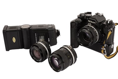 Lot 171 - A Nikon FM SLR Camera Outfit