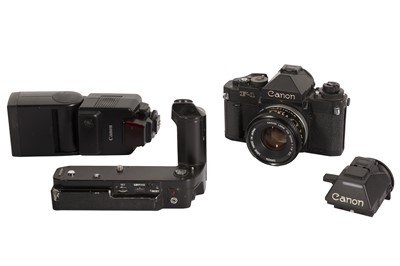 Lot 190 - A Canon F1 SLR Camera Outfit
