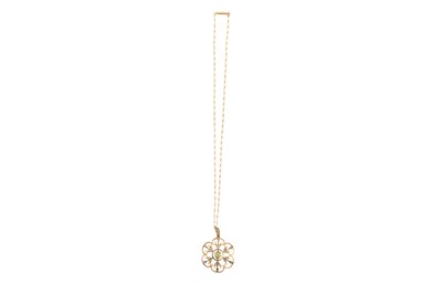 Lot 39 - A 9CT PERIDOT AND SEEDPEARL OPENWORK PENDANT