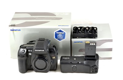 Lot 12 - Olympus E-5 4/3rds DSLR & Battery Grip.
