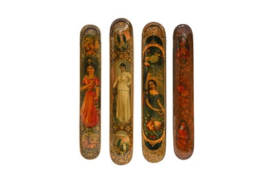Lot 64 - FOUR LACQUERED PAPIER-MÂCHÉ PEN CASES (QALAMDAN) WITH EUROPEAN FEMALE PORTRAITS